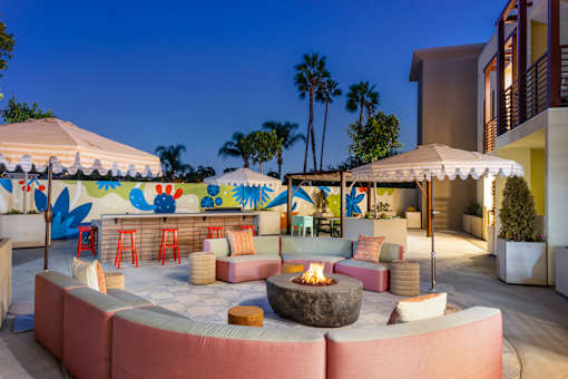 A patio with a fire pit and seating area. at The Reserve La Mirada, California, 90638