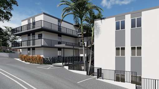 a rendering of a building with palm trees in front of it