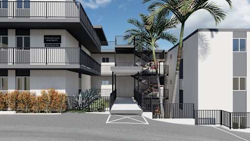 a rendering of a building with palm trees in front of it