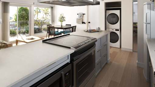 Kitchen with range and hood