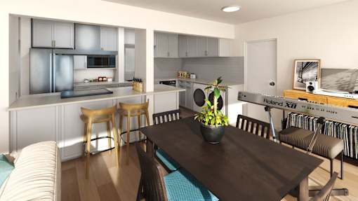 a living room and kitchen with a table and chairs