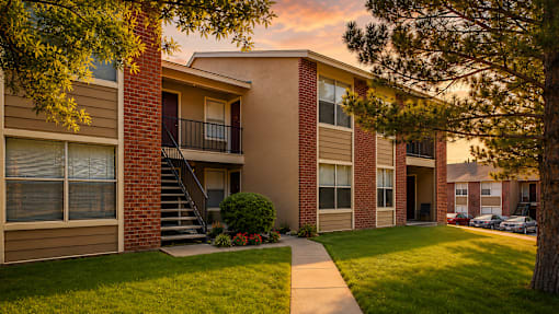 Two story apartment building with exterior staircase at Las Lomas Apartments, El Paso, TX