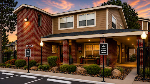 Community office entrance with covered parking area at Las Lomas Apartments, El Paso, 79912