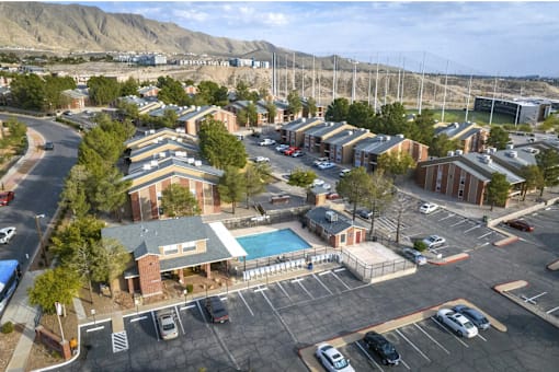 Aerial view of community pool and clubhouse at Las Lomas Apartments, Texas, 79912