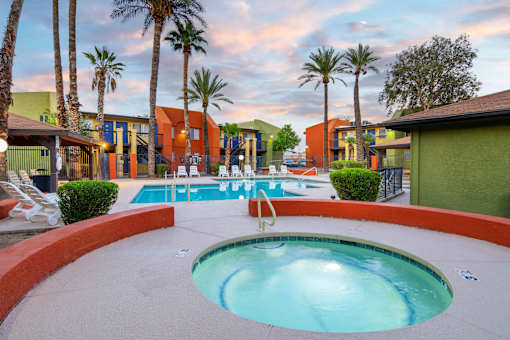 A round pool with a hot tub in the middle of it.