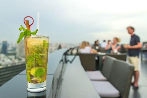a cocktail on the ledge of a skyscraper