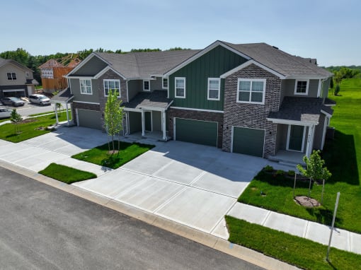 a house with a driveway and a parking lot