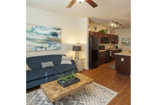 a living room with a couch and a table