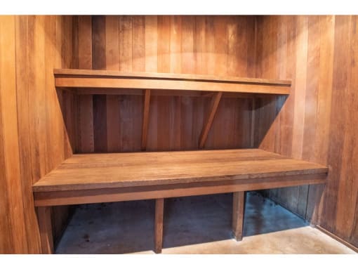 a wooden shelf in a wooden room