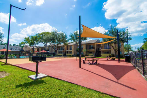our apartments offer a park with a volleyball court