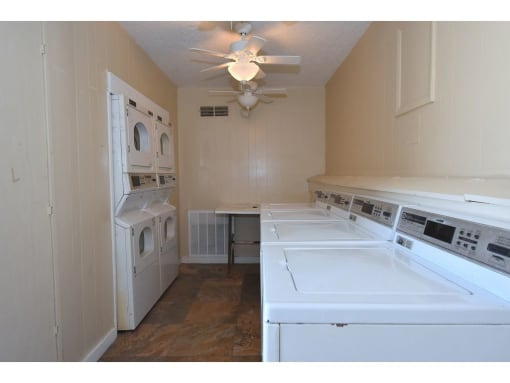 a washer and dryer are in the laundry room