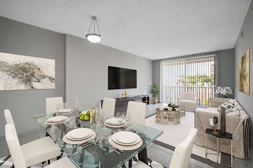 A modern dining room with a glass table set for four.