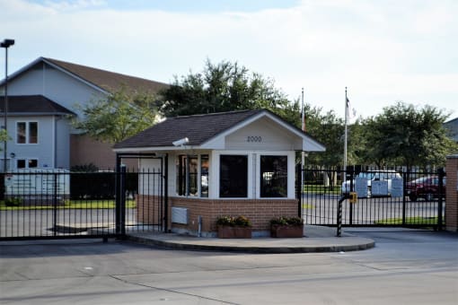 a small bus stop in front of a house