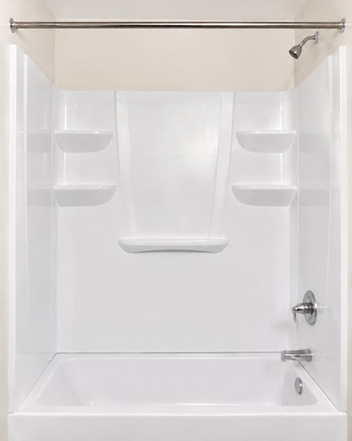 A white bathroom with a shower stall and a towel bar.