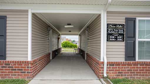 A sign on a building reads "Clifton Terrace" and "Mayfair Rd.".