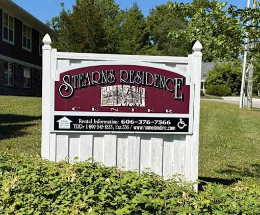 A sign for Stearns Residence with rental information.