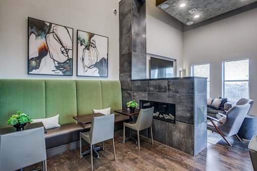 Resident co-working area featuring open workstations, contemporary seating, and professional office amenities.
