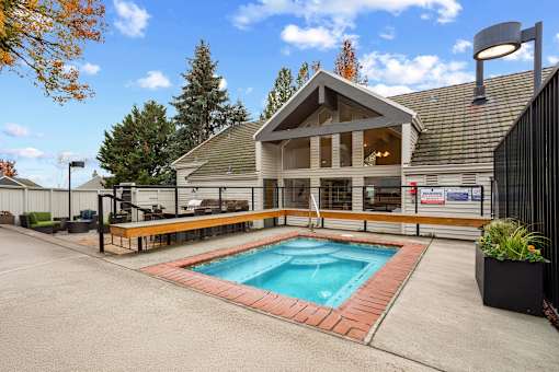 A house with a pool in the backyard.