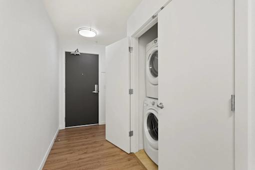 A laundry room with a washer and dryer.