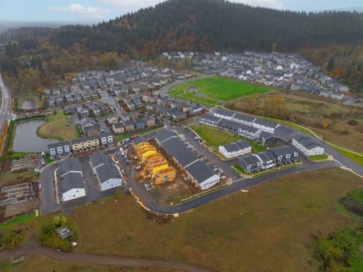 an aerial view of a city with a parking lot and buildings at Thrive at Green Mountain, Camas, 98607