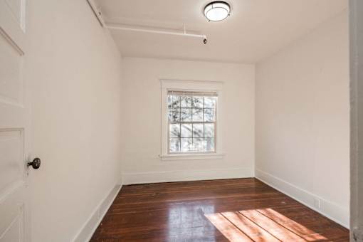 A room with a window and a door at Midtown Apartments, Portland, OR, 97209