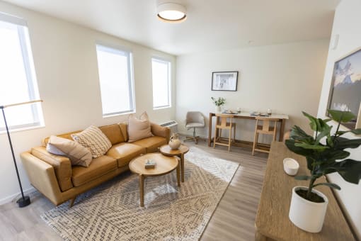 a living room with a couch and a table at Moraine, Tacoma, WA 98402