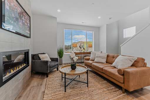 Television And Fireplace In Living Room at Thrive at Green Mountain, Camas, WA, Washington  , 98607