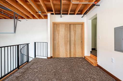 Open space with black railing at Atomic Orchard Experiment, Portland, OR, 97232