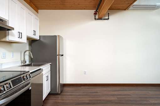 Kitchen with white cabinets at Atomic Orchard Experiment, Portland, OR
