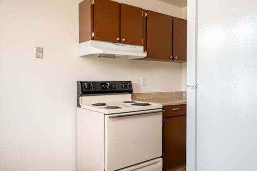 White oven and stove top at Garden Villa Apartments, Portland, Oregon