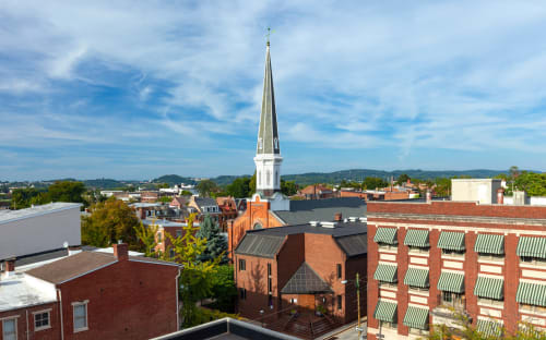a view of the city from the roof of a building