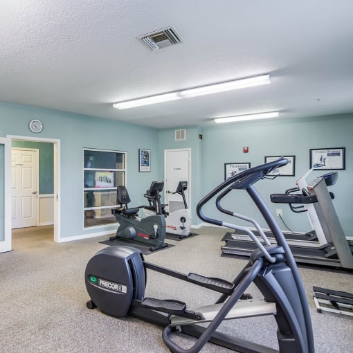 the gym at the enclave at woodbridge apartments in sugar land, tx
