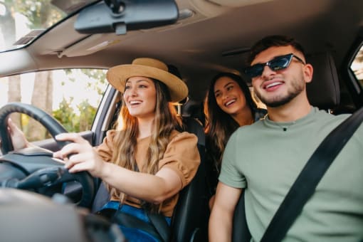 a group of people in a car