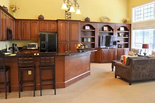 a kitchen with wooden cabinets and a counter top