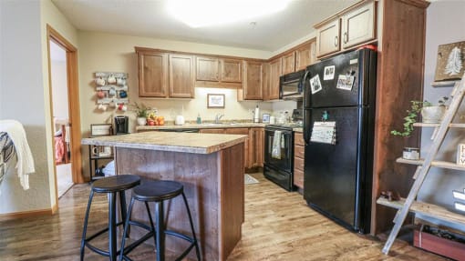 a kitchen with a counter top and a refrigerator at Boulder Ridge, Minnesota, 55811
