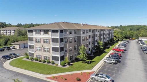 an aerial view of an apartment building in a parking lot at Boulder Ridge, Minnesota