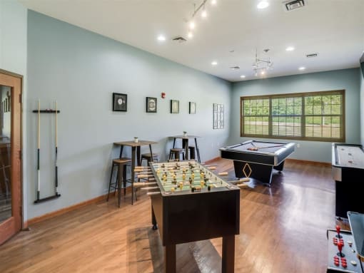the games room has a pool table and a bar  at Campus Park, Duluth, MN, 55811