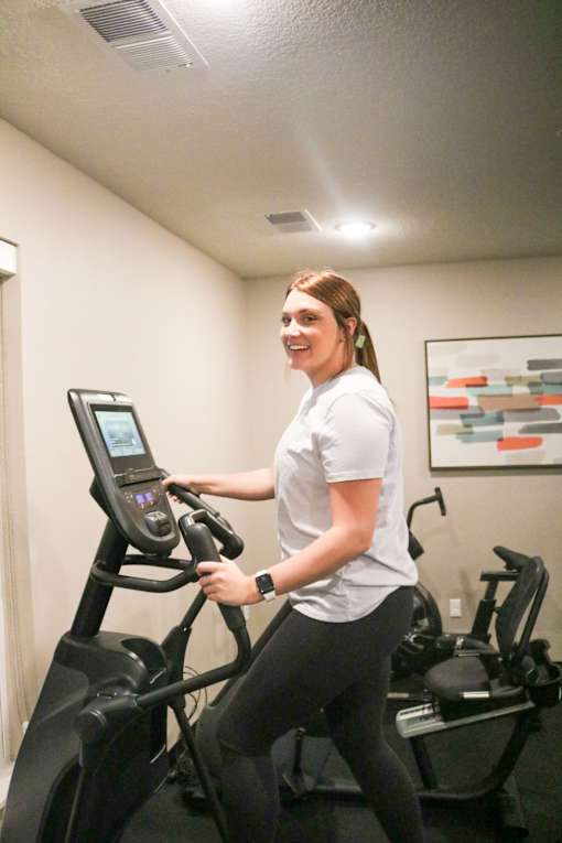 a woman running on a treadmill at the gym  at Timber Ridge, Forest Lake, MN