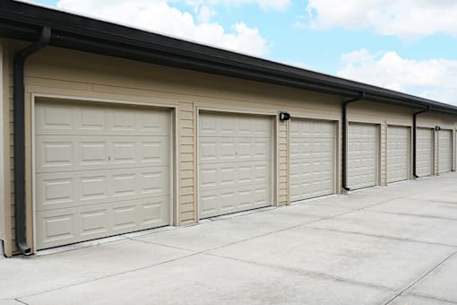 A row of closed garage doors in a row.