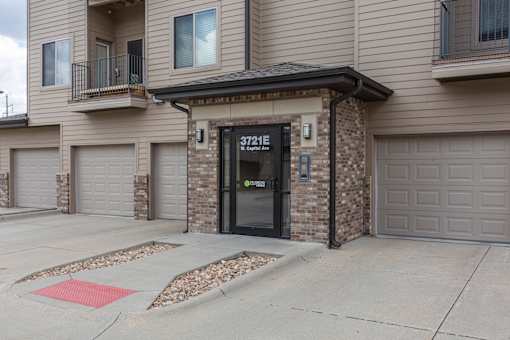 The entrance to a building with the number 3721E on it.