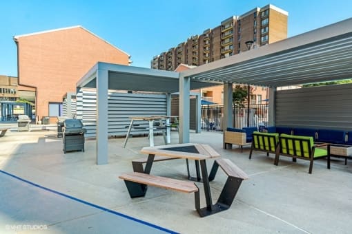 Nice shaded areas to grill and chill at Trillium Apartments, Fairfax, VA, 22031