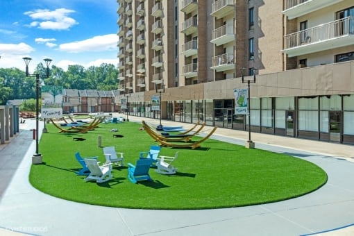 Relax in the plaza - bistro seating and hammocks galore at Trillium Apartments, Fairfax, 22031