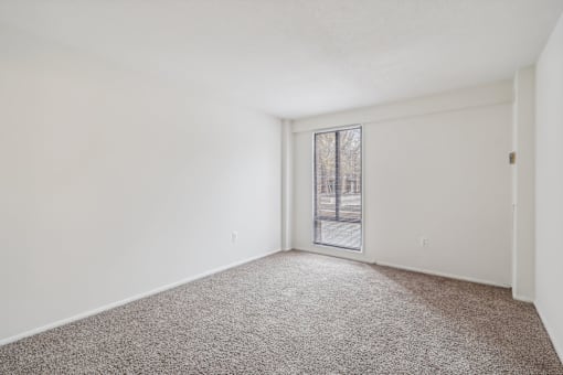 CLASSIC - Bedroom with plush carpet at Trillium in Fairfax, VA