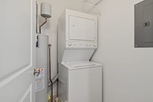 A white oven and fridge in a small kitchen.