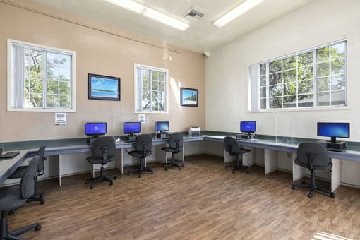 a large room with tables and chairs in it