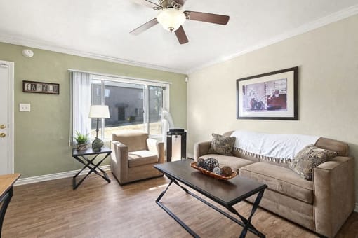 a living room with a couch and a table