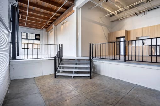 a flight of stairs in an empty room