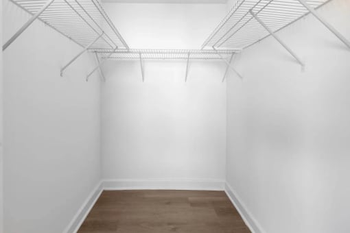 a room with white walls and a wood floor