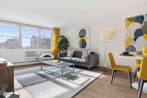 Modern open-concept living area with gorgeous city views