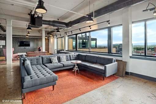 Penthouse entertainment lounge with comfortable seating at Archer Tower in Denver, CO